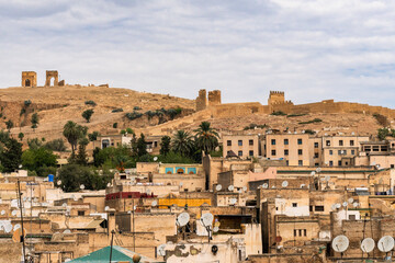 Satellite Dishes all over Fez with a glance of the Marinid Tombs, Morocco.