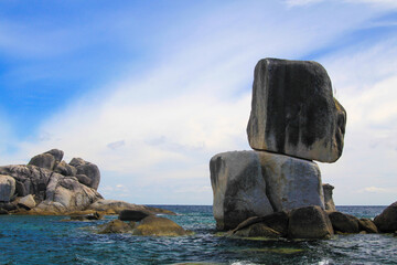View on isolated secluded remote stack boulders island in the ocean - andaman sea, Ko Lipe, Thailand