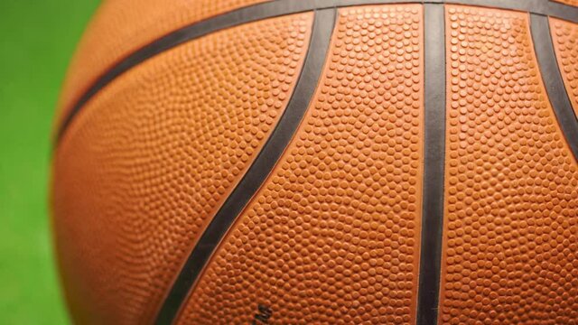 Basketball ball close up on dark black background