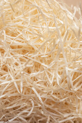 paper wrapping shavings for gifts in beige box