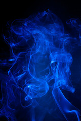 Blue smoke motion on black background.