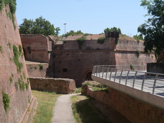 Fototapeta na wymiar Bastion of the Fortress in Grosseto belongs to the walls and has a pentagonal shape sorrounded by a moat that past time was full of water and nowadays it's a walkway.