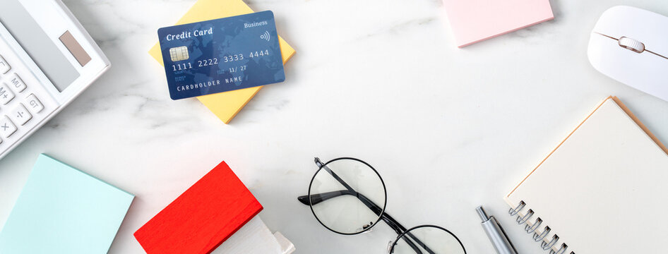 Top view of estimating and paying house tax with credit card.