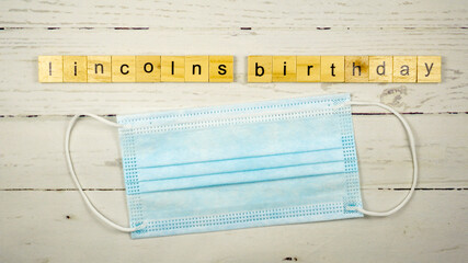 Lincoln's Birthday.words from wooden cubes with letters