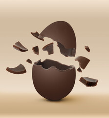Broken milk chocolate egg on beige background