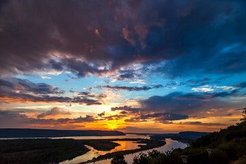 Landscape with sunset on the river in summer