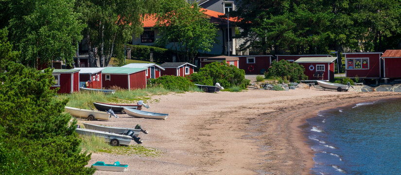 Sunny sand beach at seaside of Hanko town in southmost part of Finland
