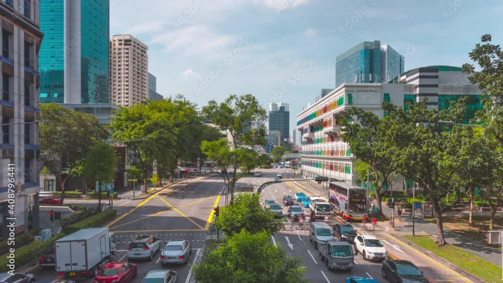 Canvas Prints SINGAPORE - FEBRUARY 2: Time lapse video 4K, Traffic view with background Singapore landmark financial business district with skyscraper, traffic into city February 2, 2020 in Singapore.