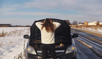 Caucasian female having a problem with car on a roadtrip Upset woman emotionally reacting on...
