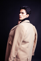 handsome asian fashion looking man posing in studio on black background, lifestyle modern people concept