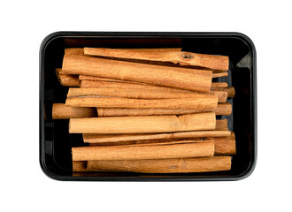 cinnamon sticks in plastic box isolated on white background ,include clipping path