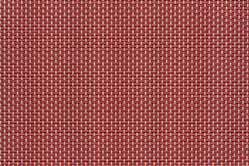 macrotexture of fabric or coarse textile material close-up with symmetric and identical mesh plexus for abstract empty background or for wallpaper