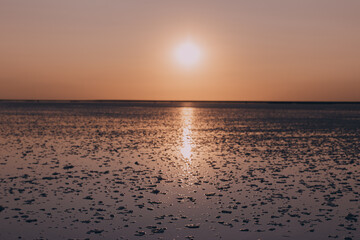 Beautiful sunset over the salty pink lake