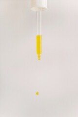 Pipette with the facial oil