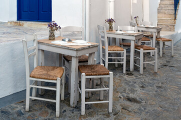 Tables and chairs of a traditional restaurant in Skyros island, Greece