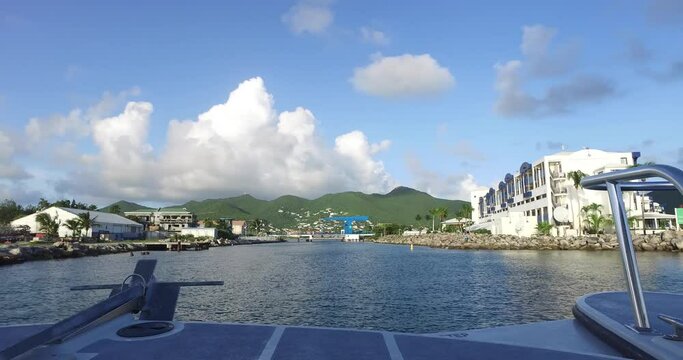 Yacht arriving at simpson bay bridge on the caribean island of st.maarten
