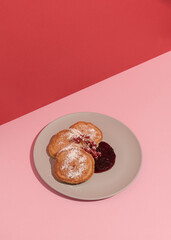 Plate with sweet cheesecakes, abstract composition. Conceptual art, still life, copy space