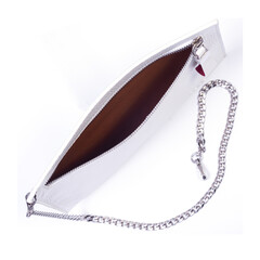 White women's handbag with a chain..