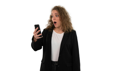 Portrait of a surprised woman holding smartphone in her hand. White background.