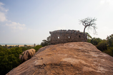Gigantic granite boulder  and stone temples in the historical town of Mamallapuram in Tamil Nadu,...