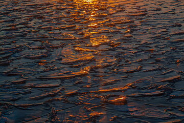 Ice on the river in the sun