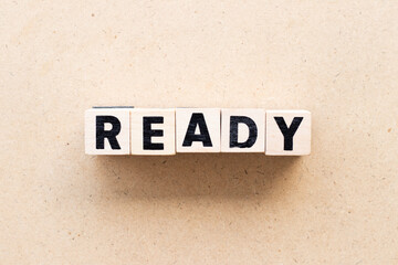 Obraz premium Letter block in word ready on wood background