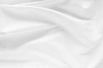 Abstract white fabric texture background. Cloth soft wave. Creases of satin. silk and cotton.