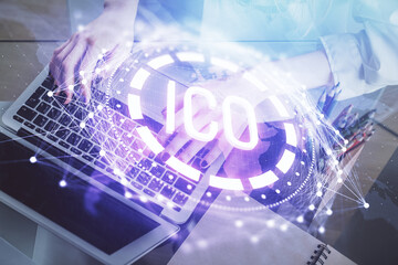 Double exposure of woman hands typing on computer and crypto market theme hologram drawing. Blockchain concept.