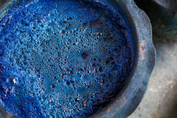  indigo color in clay pot for tie batik dyeing - obrazy, fototapety, plakaty