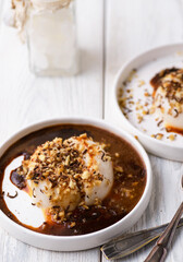 panna cotta with sauce and nuts