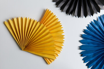 background with colored leaves from paper on a white background. place for an inscription.