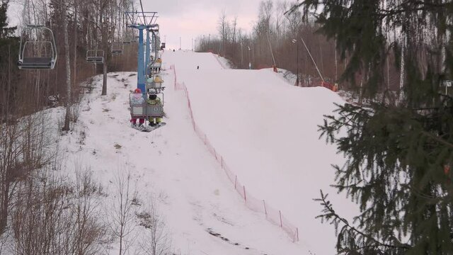 A ski lift for transporting skiers and snowboarders on a snow-covered ski slope. Stepanovo, Moscow region.
