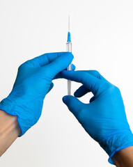 the vaccine for coronavirus covid 19 hands with gloves vertical