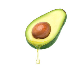 Avocado oil dripping from avocado fruit isolated on white background. Clipping path.