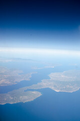 view of the earth from the airplane, flight above the clouds