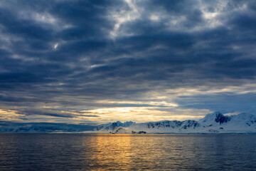 Antarctic sunset over Graham Land and the ocean.