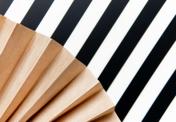 paper background with black and white striped background. abstraction