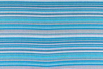 Striped fabric textile background in blue, white and gray colors