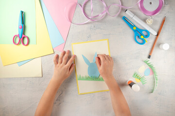 DIY and kids creativity. Step by step instruction: how to make card Happy easter. Step3 glue paper...