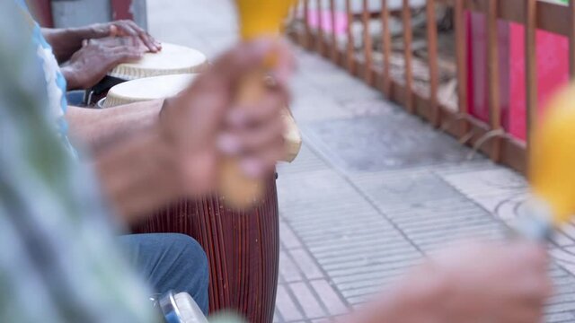Street performers play at Calle el Conde at Santo Domingo. Focus on background
