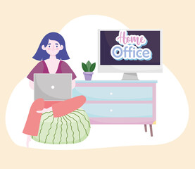 woman using laptop sitting on bean chair home office