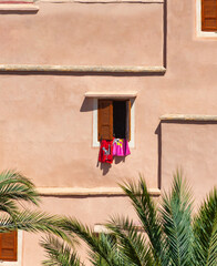 Open window on a pink wall