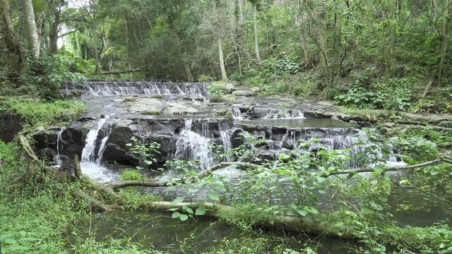 Beautiful stream and waterfall in tropical forest at Namtok Samlan National Park, Saraburi, Thailand