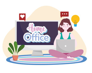 Fototapeta premium young woman using laptop sitting on floor home office