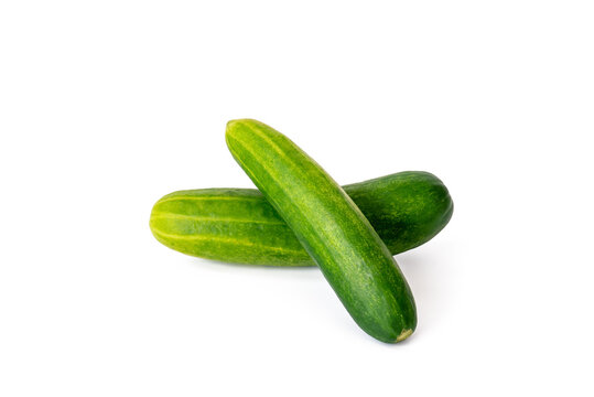 Double cucumber isolated over white background.