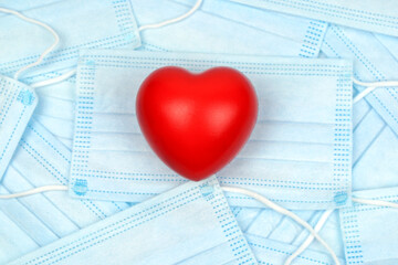 Red heart blue mask background. 