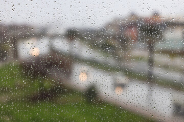 Rain drops on window glass. Abstract background texture. Weather forecast Antalya Turkey, Selective focus.