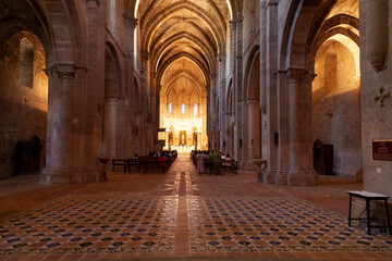 Fototapeta premium Central nave of the Romanesque Gothic style church of the Royal Monastery of Santa Maria de Veruela, in the region of Tarazona y el Moncayo, Aragon, Spain.