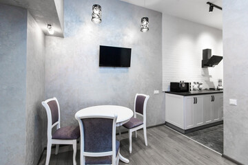 interior photography, kitchen studio in modern loft style in bright colors with furniture