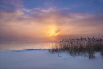watercolor winter sunset on misty lake